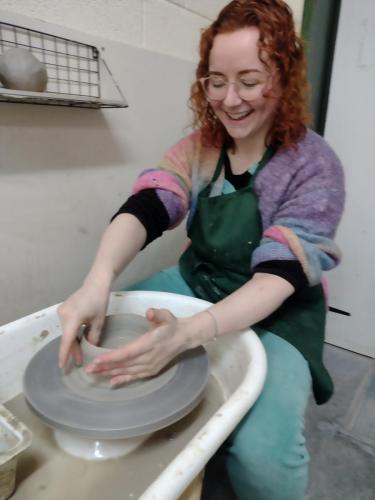 Attending pottery classes